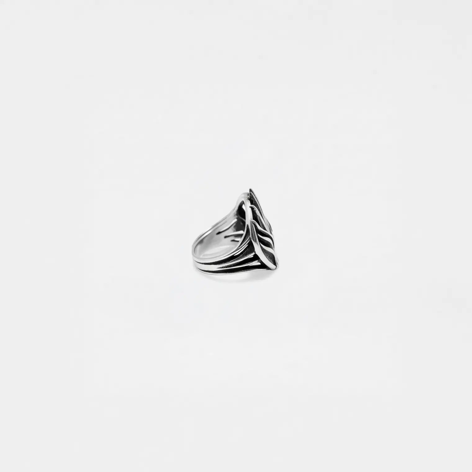 Silver agave ring on a light gray background
