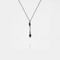 ARROW SILVER PENDANT ON A WHITE BACKGROUND