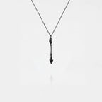 ARROW SILVER PENDANT ON A WHITE BACKGROUND