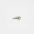 Silver bee ring with a gold bee design on a white background