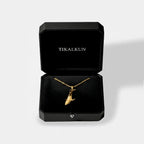 Blue-whale gold pendant inside a TIKALKUN jewelry box