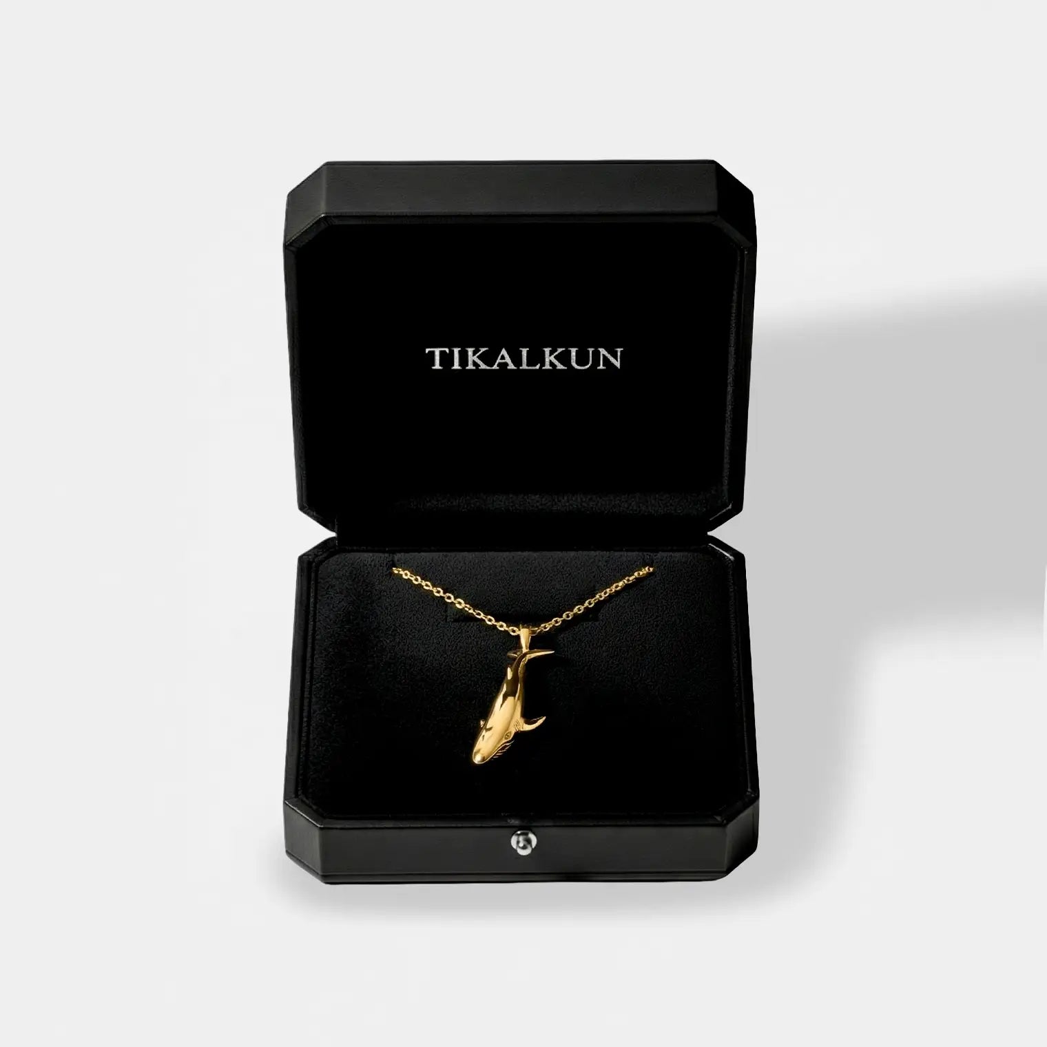 Blue-whale gold pendant inside a TIKALKUN jewelry box