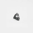 Silver carnival mask ring on a white background