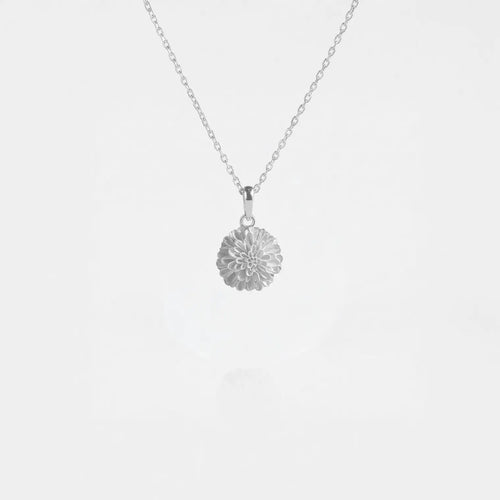 Marigold flower silver necklace on a white background