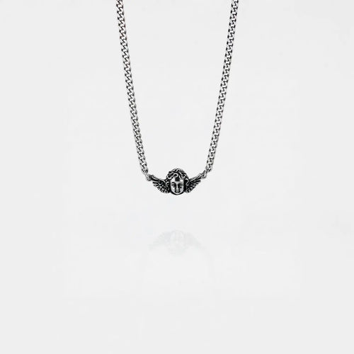 cherub silver necklace on a white background