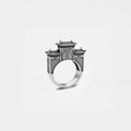 Silver ring with chinese  architectural design on a white background