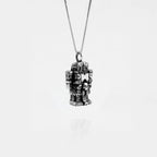 COATLICUE SILVER NECKLACE ON A WHITE BACKGROUND