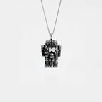 COATLICUE SILVER NECKLACE ON A WHITE BACKGROUND