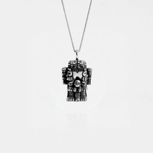 COATLICUE SILVER NECKLACE ON A WHITE BACKGROUND