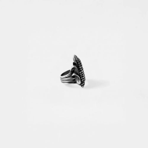 Silver corn ring on a white background