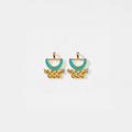 Gold and turquoise aztec earrings on a white background