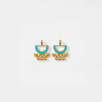 Gold and turquoise aztec earrings on a white background