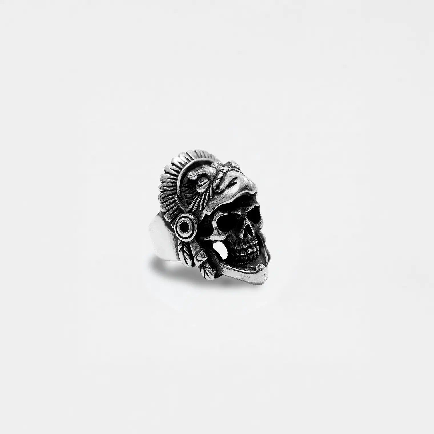 Silver EAGLE-WARRIOR skull ring on a light gray background