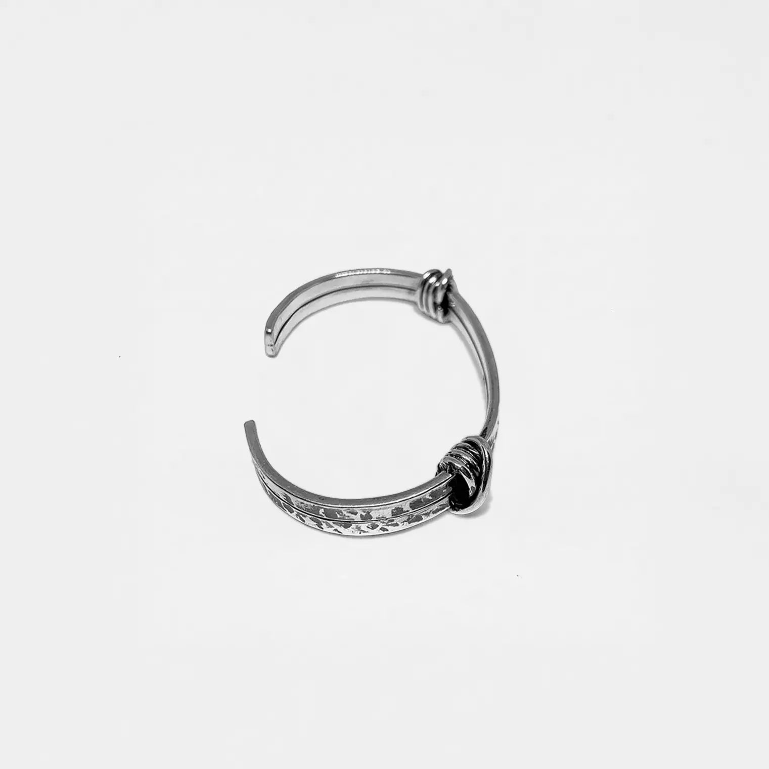 Silver BRACELET on a light gray background