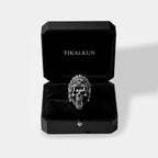  jaguar-warrior Skull ring in a black Tikalkun box on a light gray background