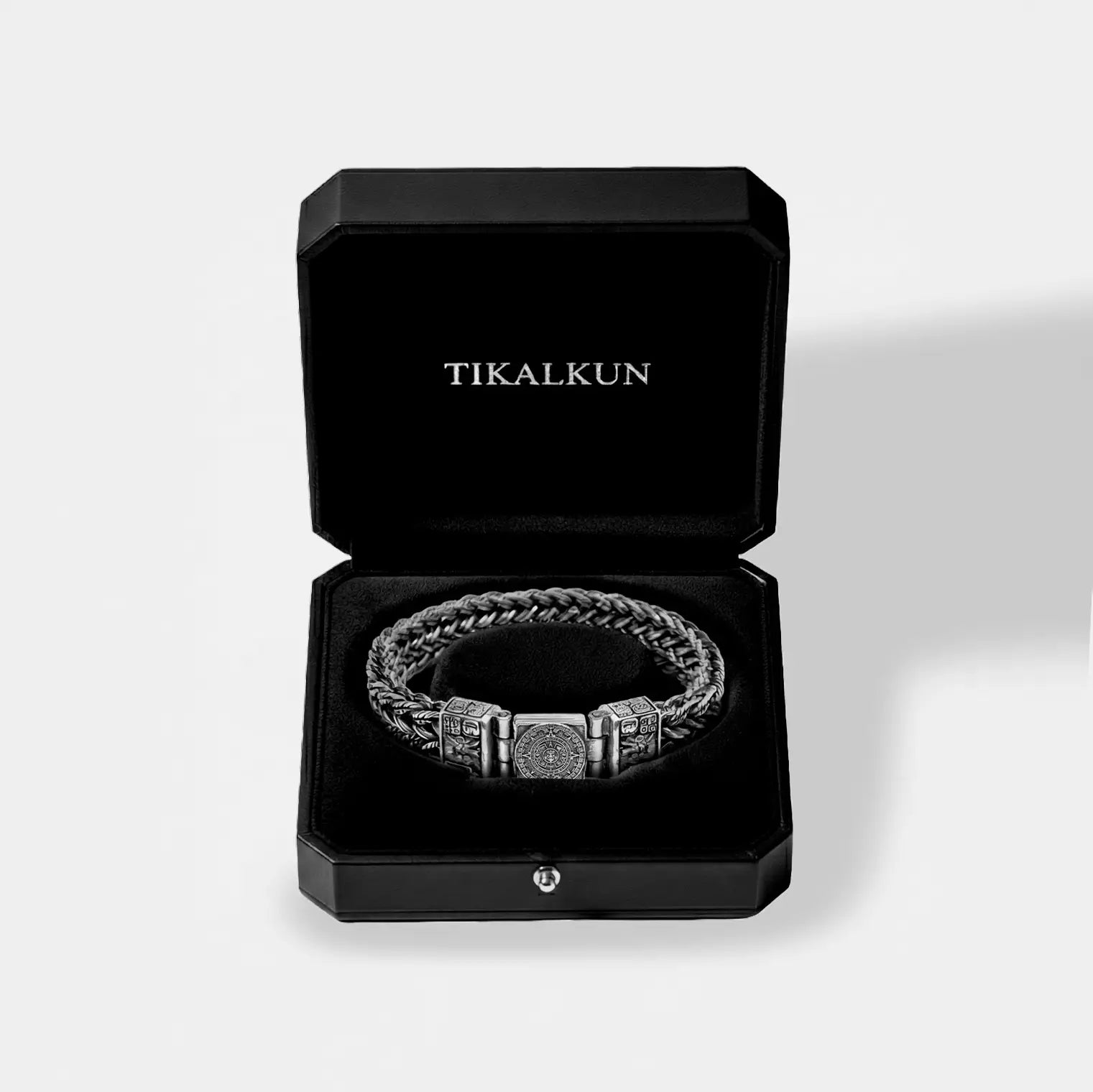 Bracelet in a black Tikalkun box on a light gray background