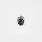 Silver medieval shield ring on a white background