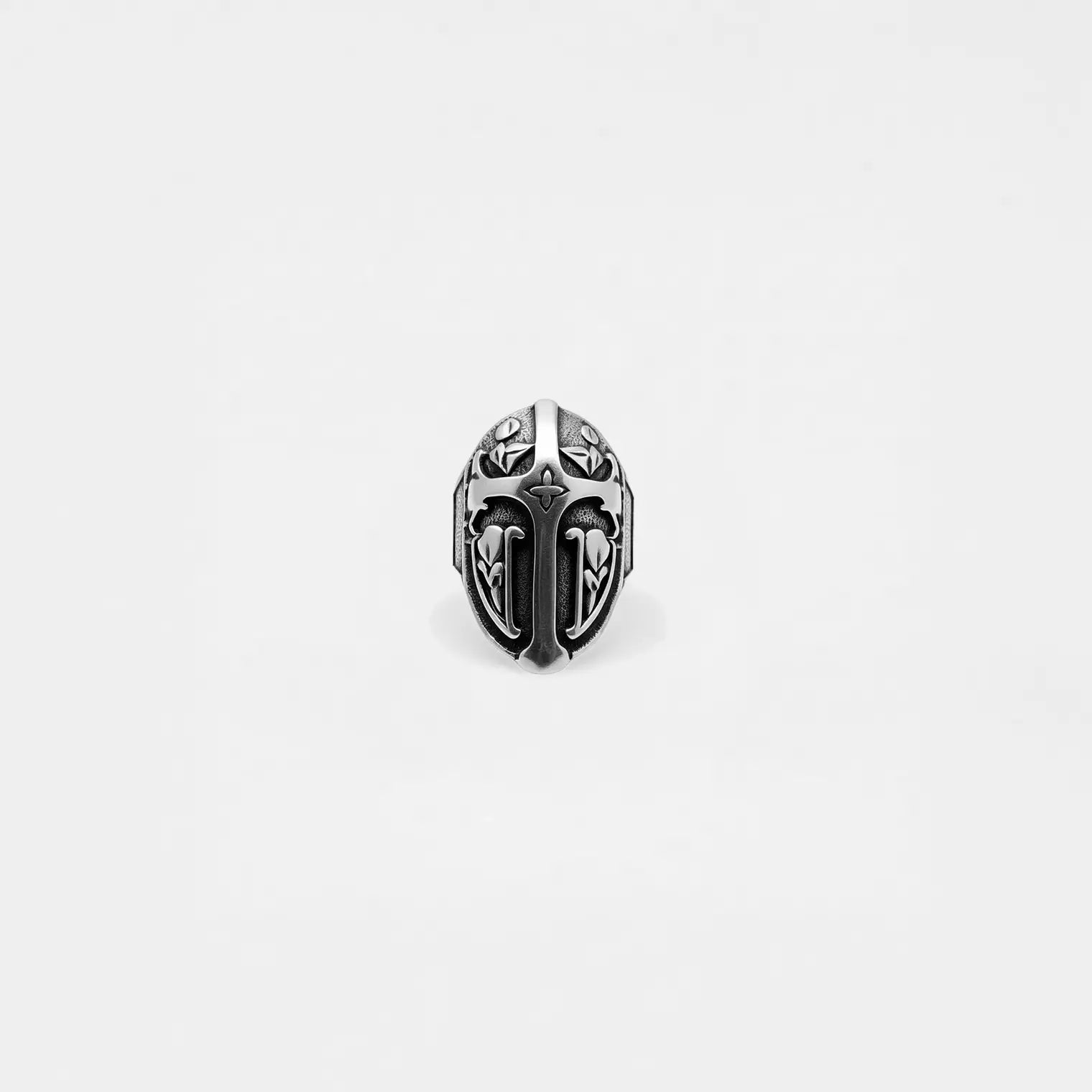 Silver medieval shield ring on a white background