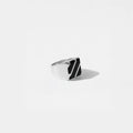 Silver ring with OBSIDIAN STRIPES  design on a light gray background