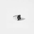 Silver ring with OBSIDIAN STRIPES  design on a light gray background