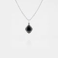 Necklace with a black teardrop pendant on a white background