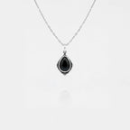 Necklace with a black teardrop pendant on a white background