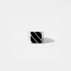Silver ring with OBSIDIAN STRIPES  design on a light gray background