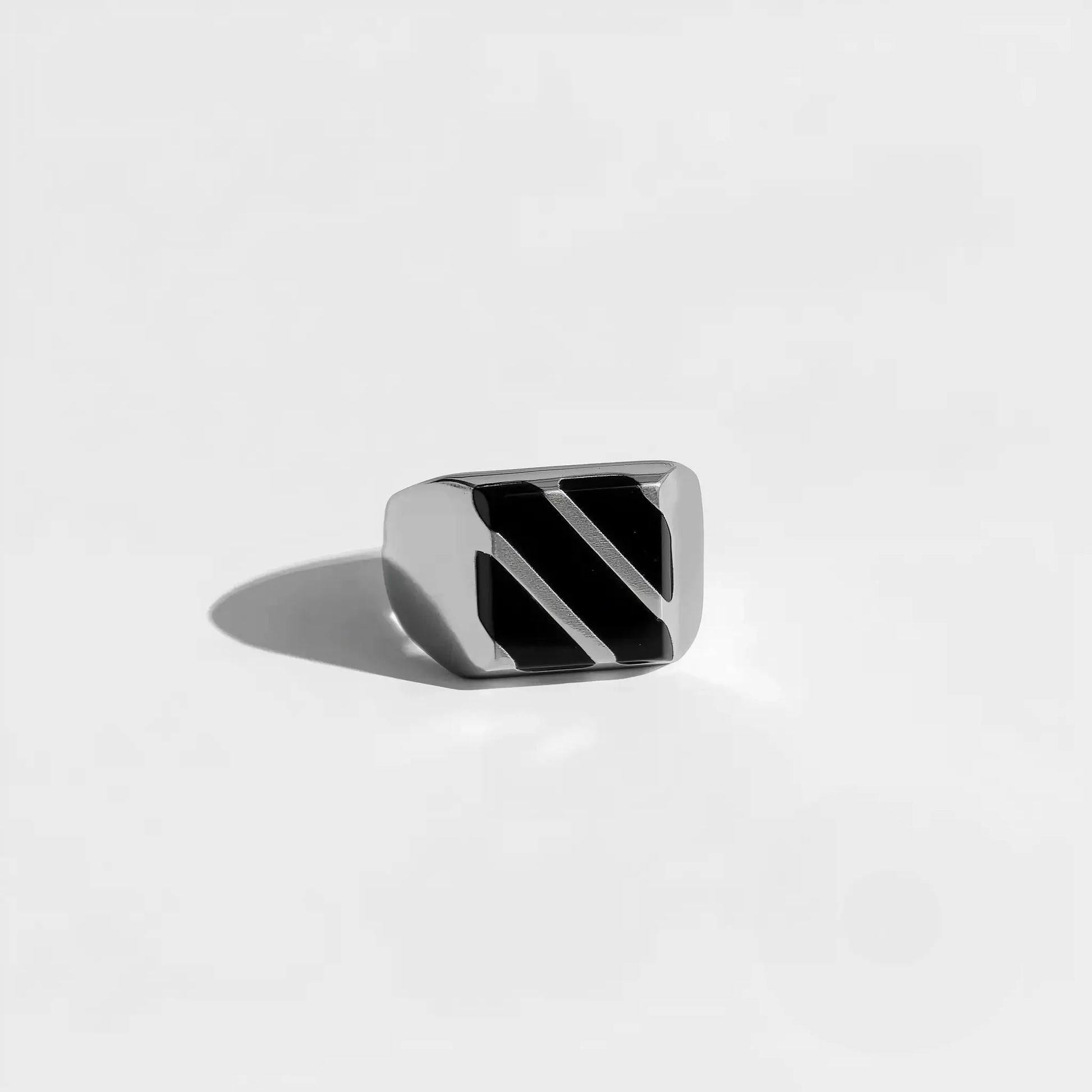Silver ring with black and white striped design obsidian stone