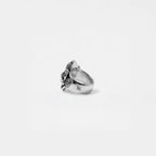 Silver ganesha ring on a white background