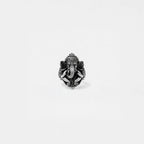 Silver elephant head ring on a white background