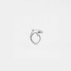 Silver orca ring on a light gray background