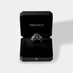 Rabbit Silver ring in a black Tikalkun jewelry box on a light gray background