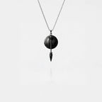 Roman shield and spear pendant necklace on a white background