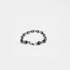 Silver roses bracelet on a white background
