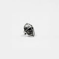Silver spearman helmet ring on a light gray background