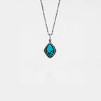Necklace with a turquoise pendant on a white background