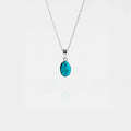 Turquoise pendant necklace on a white background