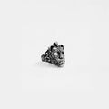 Silver venetian mask ring on a white background