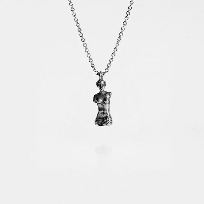 Silver necklace with a VENUS DE MILO pendant on a white background