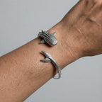 whale shark silver bracelet worn by a person