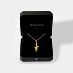 White-shark gold pendant inside a TIKALKUN jewelry box