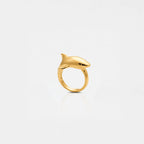 WHITE-SHARK GOLD RING ON A WHITE BACKGROUND
