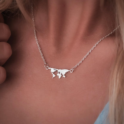 minimalist world map silver necklace