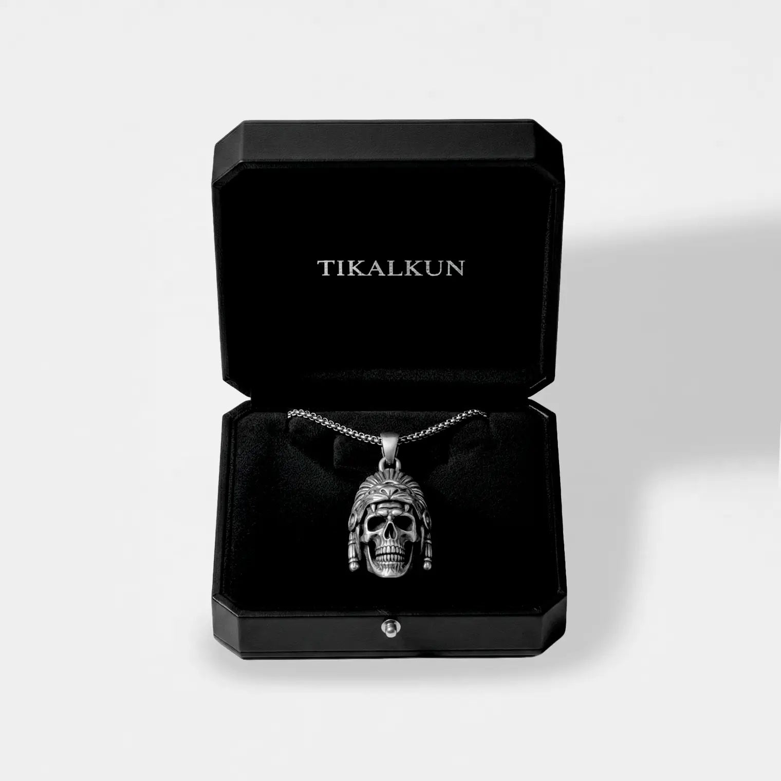 jaguar warrior silver pendant inside leather jewelry box that says TIKALKUN