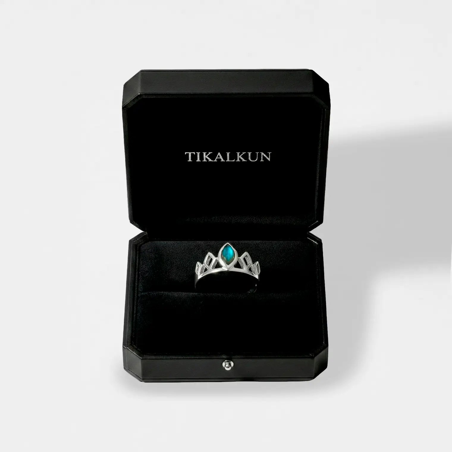 mayan princess crown Silver ring with a labradorite stone in a black Tikalkun box on a light gray background