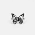 Silver monarch butterfly ring on a black background