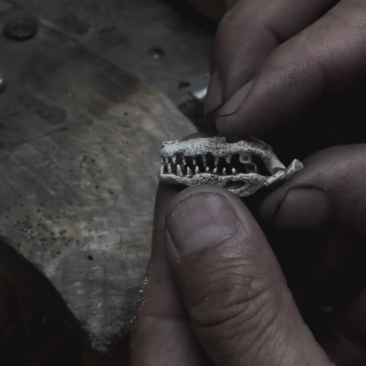 video of the elaboration process for the crocodile skull pendant