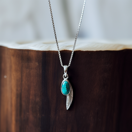 turquoise with a feather silver pendant