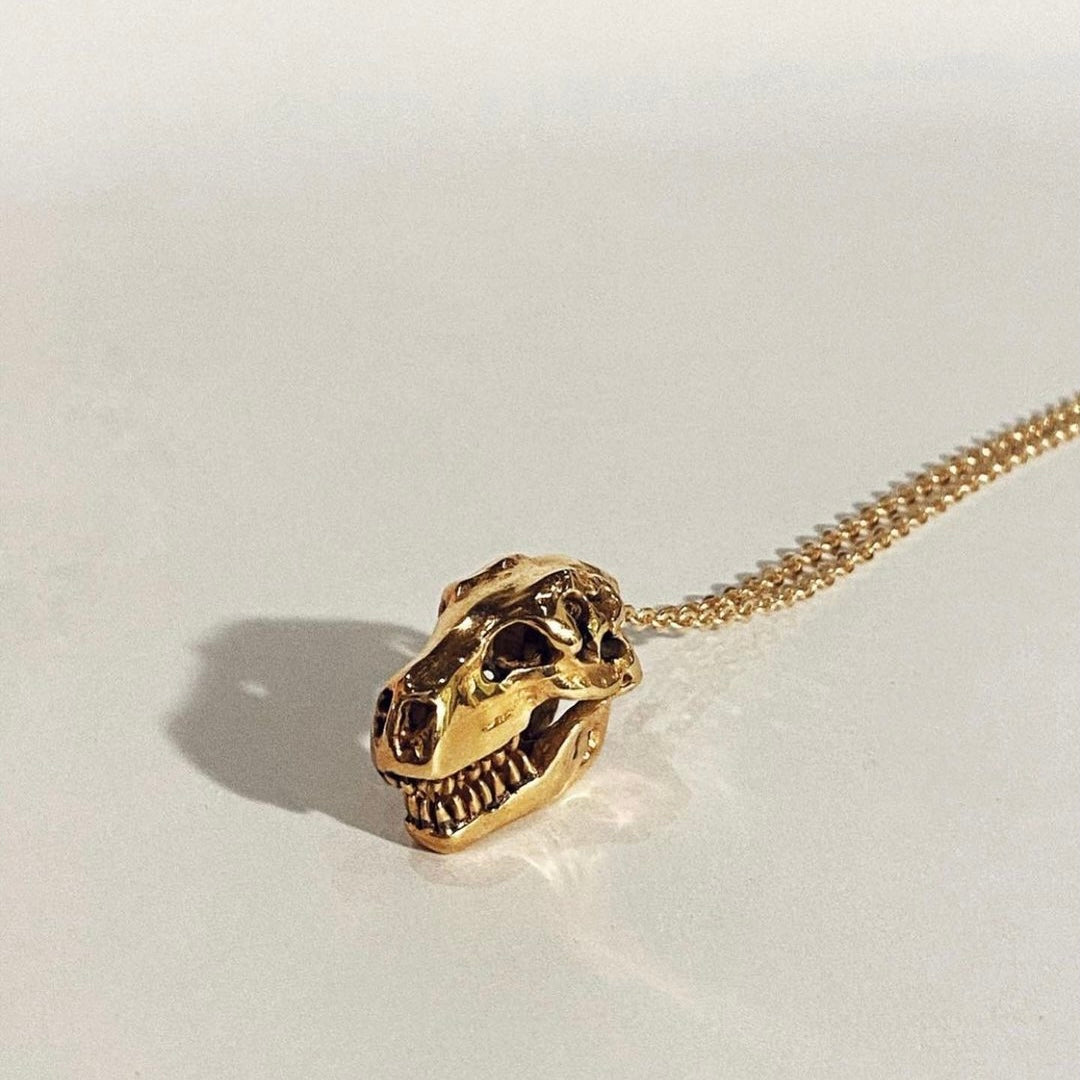 dinosaur skull gold necklace