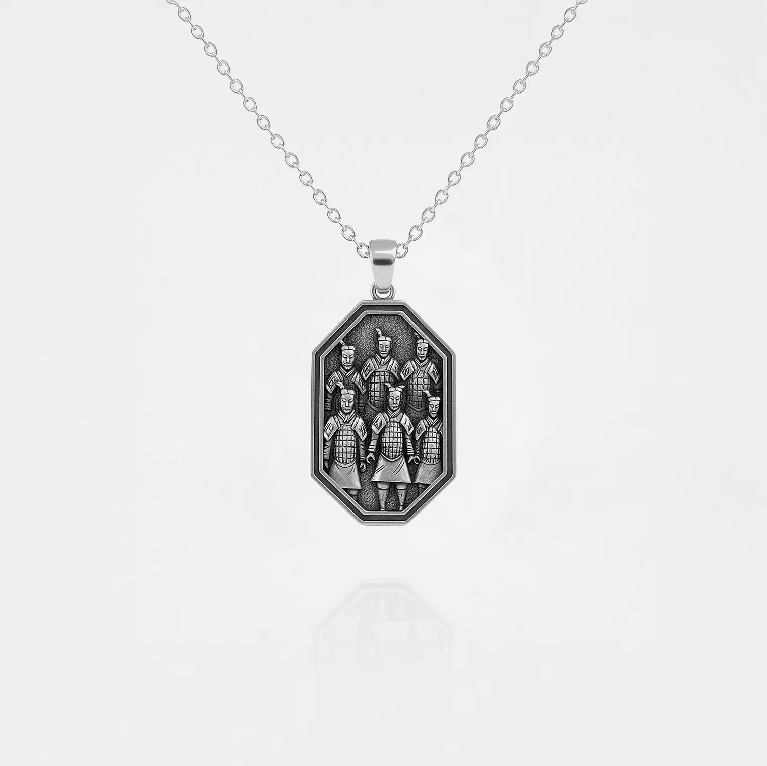 Handcrafted terracota army silver pendant on a white background